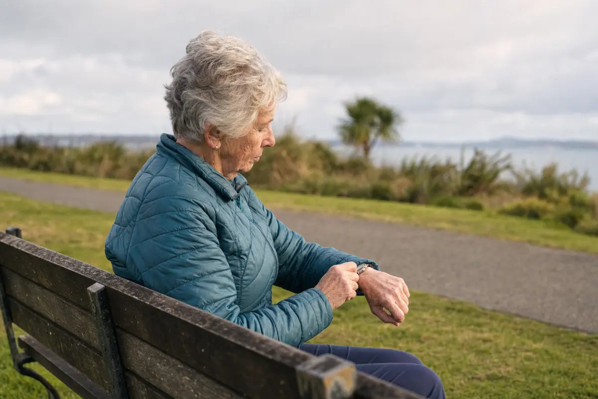 Taking a moment on a bench after a walk